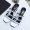 Saint Laurent Cassandra Heeled Slides Women Patent Leather White