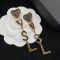 Saint Laurent Opyum Heart Earrings In Metal and Crystal Gold